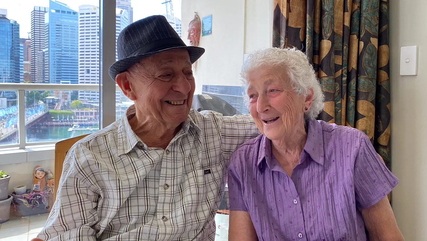 Elderly couple laughing together